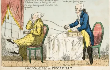 Rysunek satyryczny, prawdopodobnie z przełomu XVIII i XIX wieku, na którym bogaty londyński klient uskarżający się na brak libido poddawany jest terapii galwanicznej przez francuskiego wędrownego znachora /  / SCIENCE MUSEUM / EAST NEWS