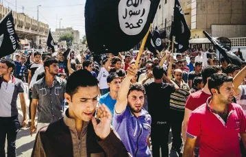 Początki Państwa Islamskiego: dżihadyści wkraczają do Mosulu, czerwiec 2014 r. / Fot. AP / EAST NEWS