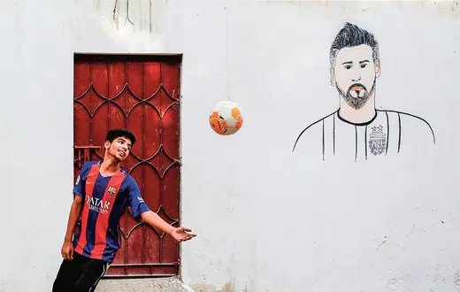 Lionel Messi na ścianach biednej dzielnicy Karaczi, Pakistan, czerwiec 2018 r. / AKHTAR SOOMRO / REUTERS / FORUM