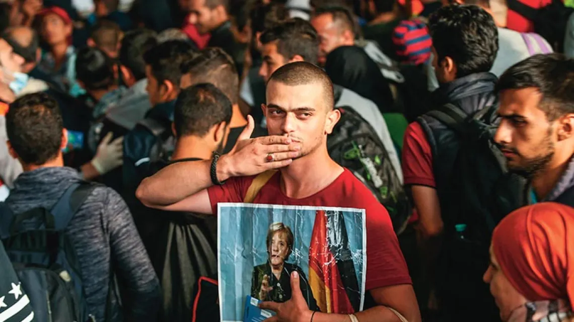 Uchodźcy z Syrii na dworcu w Monachium, 5 września 2015 r. / Fot. Sean Gallup / GETTY IMAGES