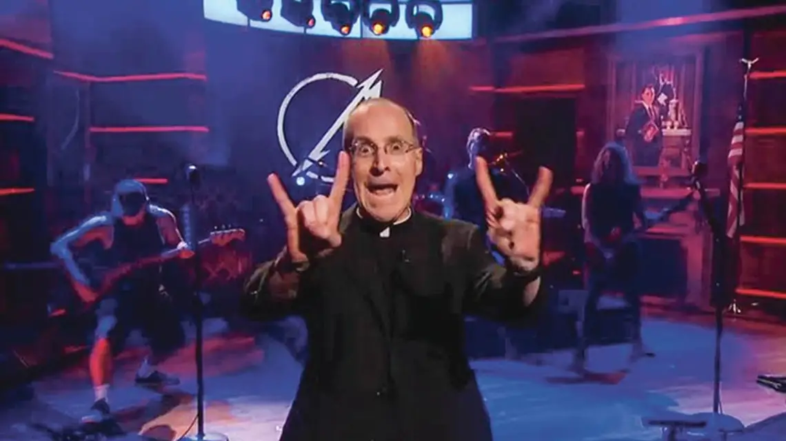 Ojciec James Martin zapowiada grupę Metallica w programie „The Colbert Report” / Fot. Screen z programu „The Colbert Report”