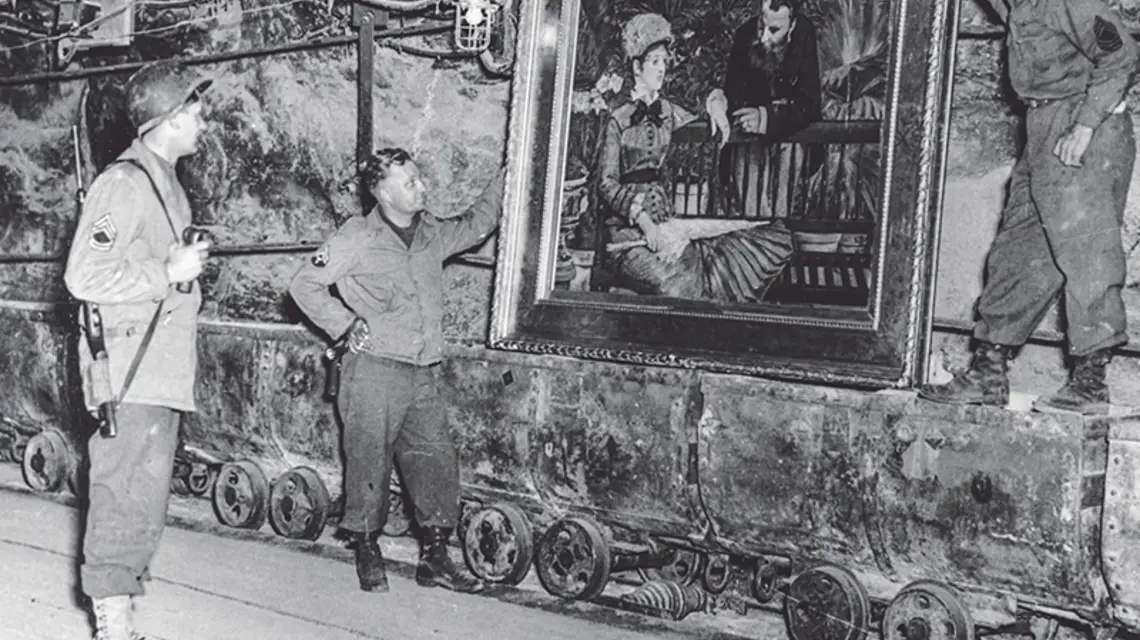 Niemiecka technologia nuklearna i rakietowa, a przy okazji zrabowane dzieła sztuki wpadały w ręce Amerykanów wiosną 1945 r. Na zdjęciu: żołnierze 50. Dywizji Piechoty US Army w kopalni soli w Merkers z obrazem Édouarda Maneta „Ogród zimowy”. / Fot. Keystone / GETTY IMAGES