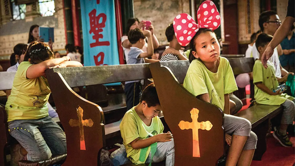Najmłodsi katolicy Państwa Środka podczas letniej oazy w Pekinie, sierpień 2014 r. / Fot. Kevin Frayer / GETTY IMAGES