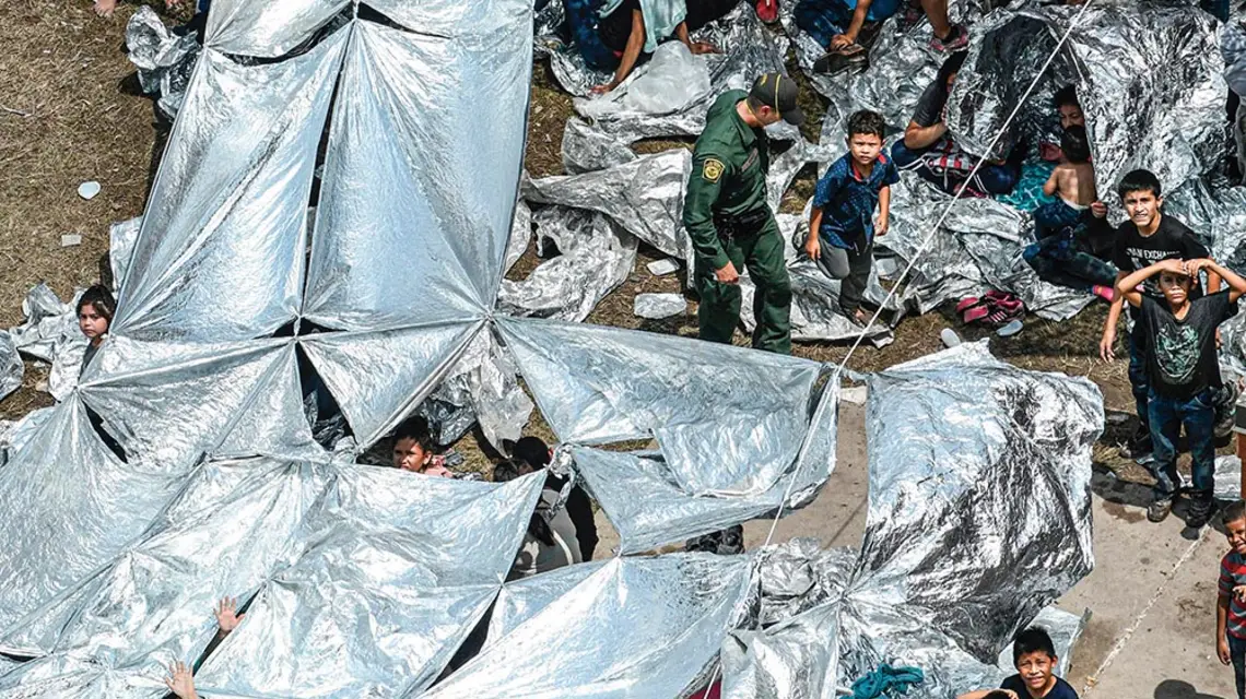 Prowizoryczne obozowisko migrantów na granicy z Meksykiem, McAllen, Teksas, maj 2019 r. / FORUM