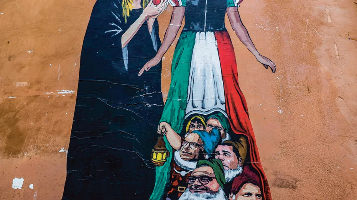 Mural przedstawiający Giorgię Meloni (Bracia Włosi) i przywódców pozostałych włoskich partii politycznych biorących udział w nadchodzących wyborach. Rzym, 2 września 2022 r. /  / FABIO FRUSTACI / EPA / PAP