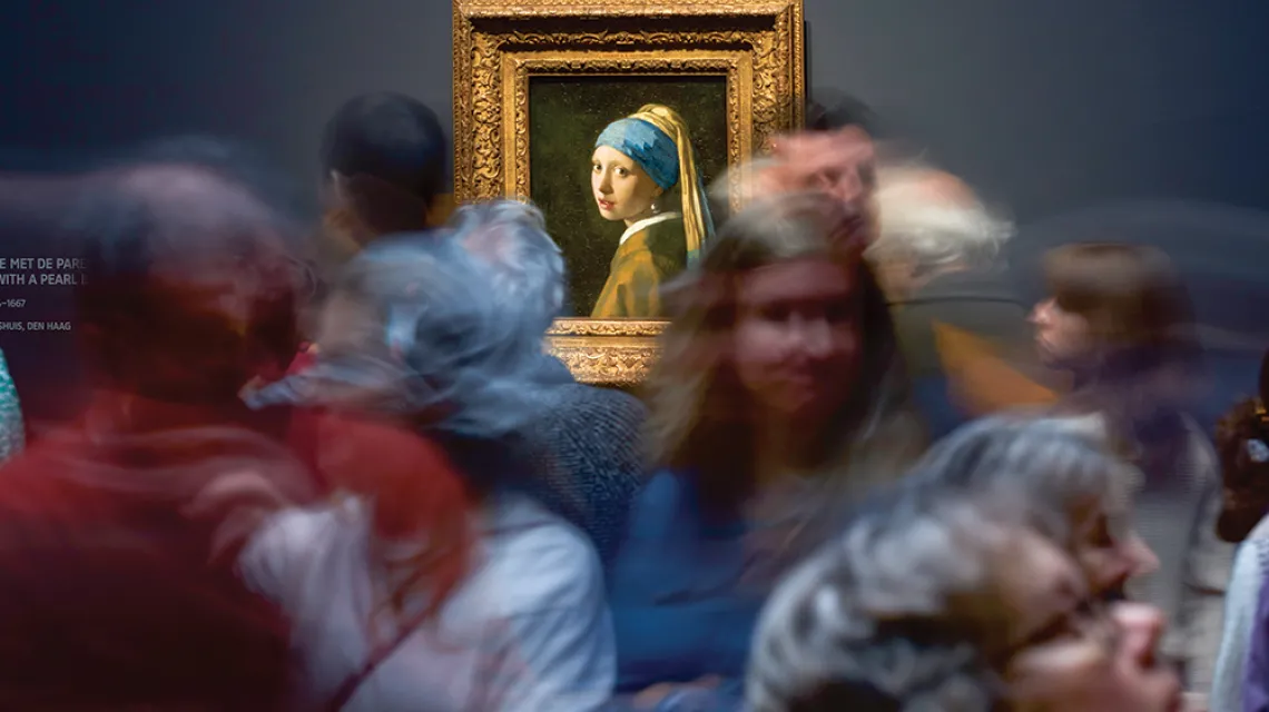 Wernisaż wystawy Vermeera w Rijksmuseum. W tle „Dziewczyna z perłą”. Amsterdam, 29 lutego 2023 r. / JENS UMBACH / LAIF / FORUM