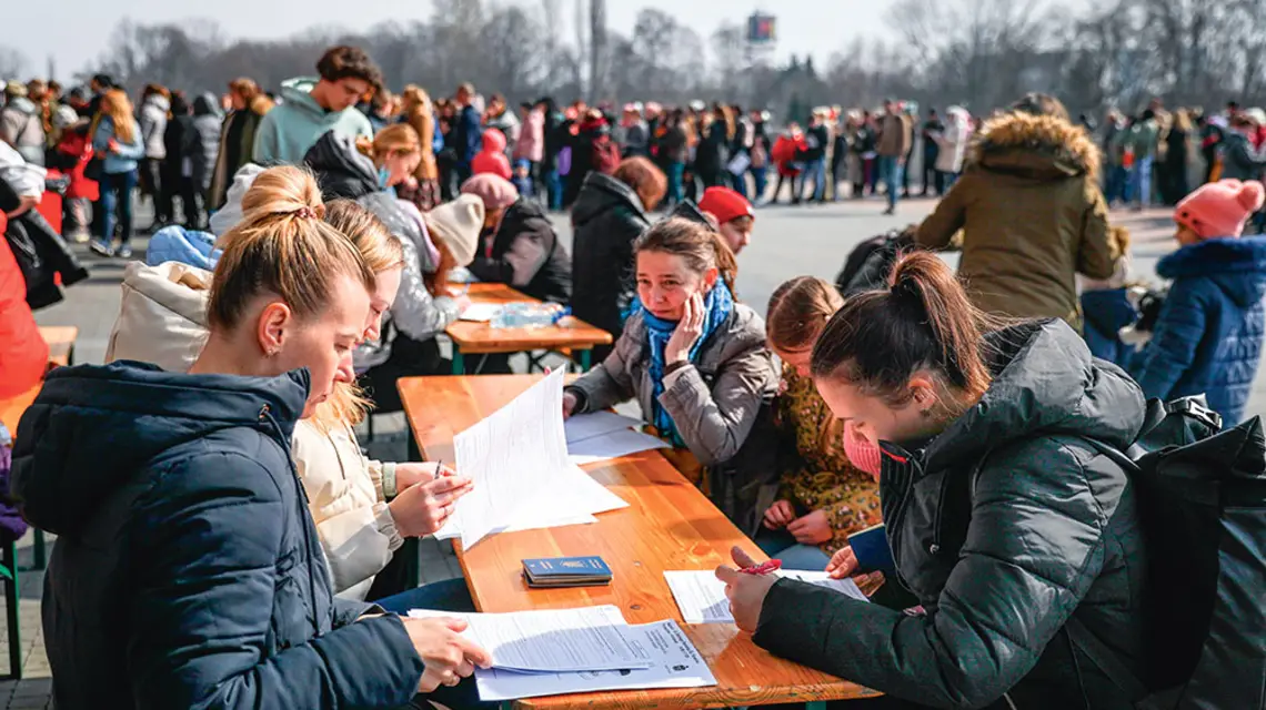 Uchodźcy z Ukrainy w kolejce po PESEL. Kraków, 16 marca 2022 r. / BEATA ZAWRZEL / REPORTER