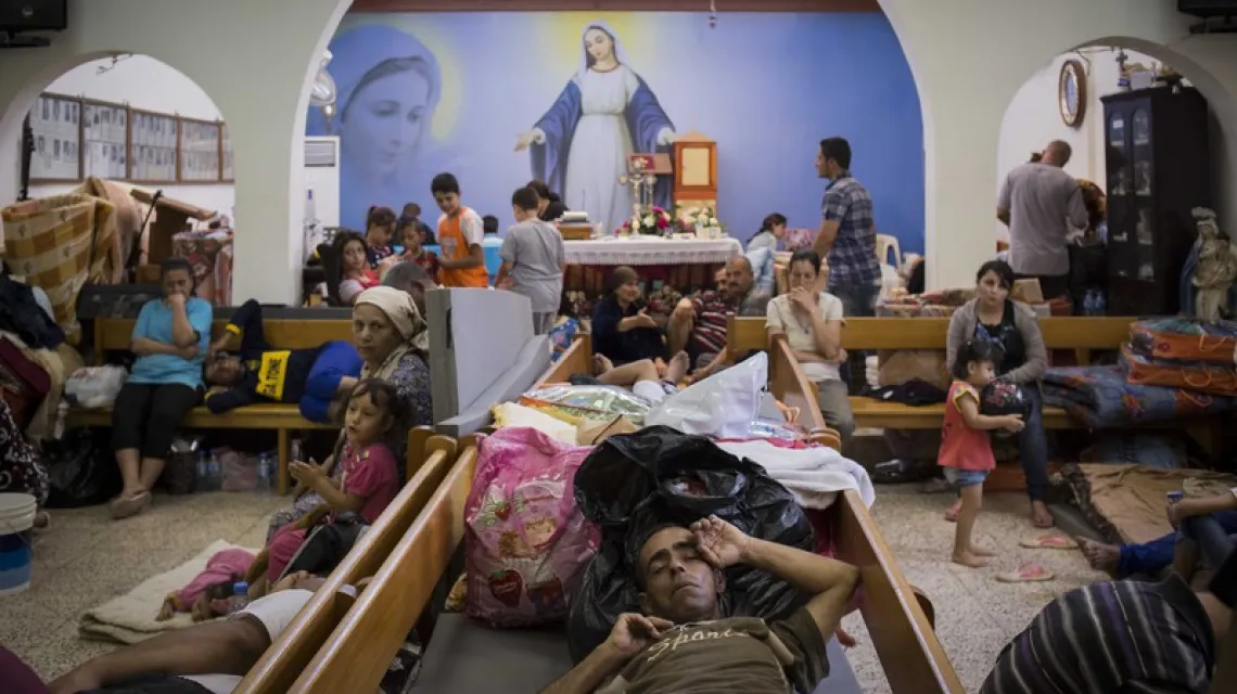 Uchodźcy śpią w Kościele w Ankawie, Irak. Fot: Vianney LE CAER/SIPA / 