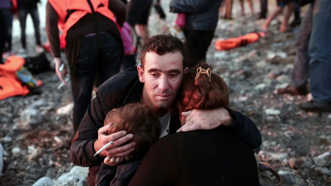 Migranci z Syrii przypłynęli na grecką wyspę Kos. 13 sierpnia 2015 r. /  / fot. AFP / East News