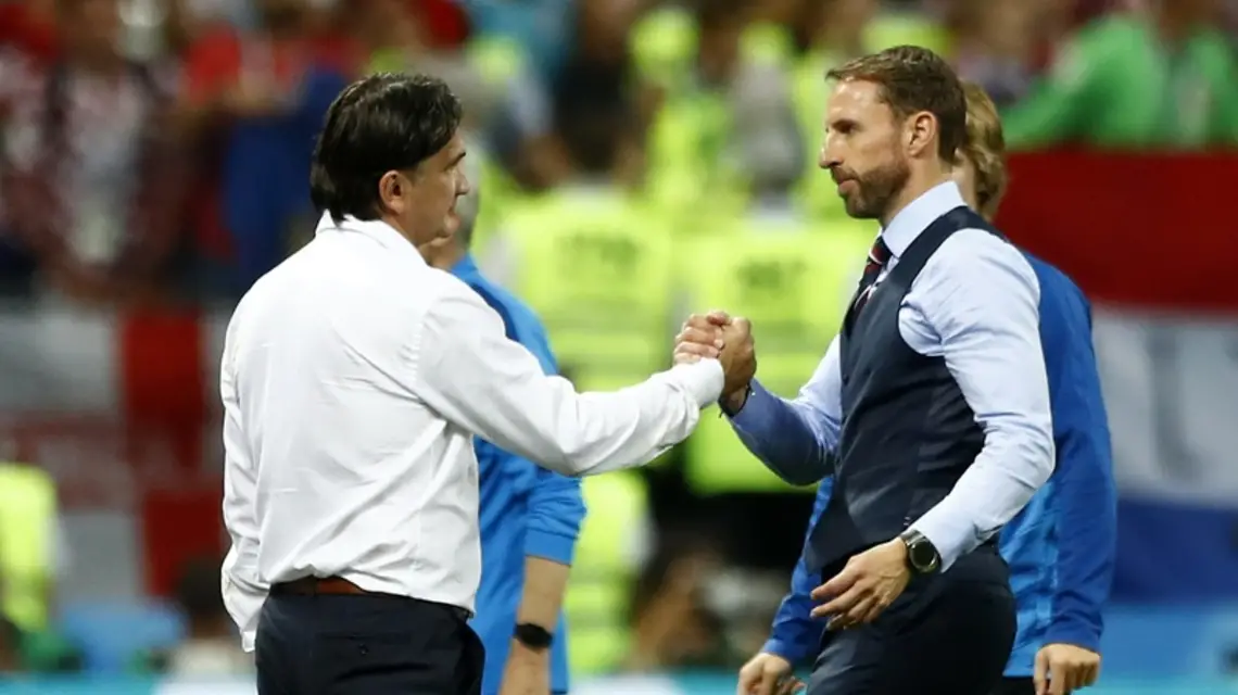 Trenerzy Zlatko Dalić i Gareth Southgate po meczu, 11 lipca 2018 r. / Fot. Matthias Schrader / AP Photo / East News / 