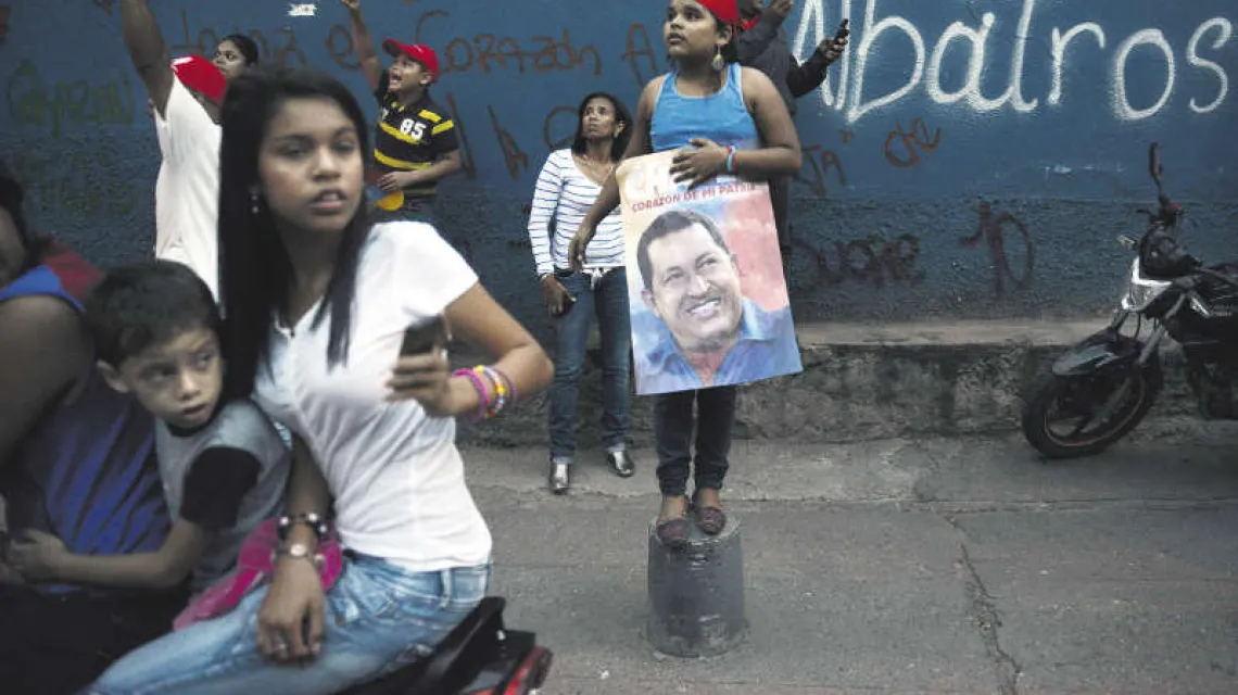 Zwolenniczki prezydenta Chaveza podczas kampanii wyborczej na ulicach Caracas; 17 września. / Fot. Leo Ramirez / AFP / EAST NEWS