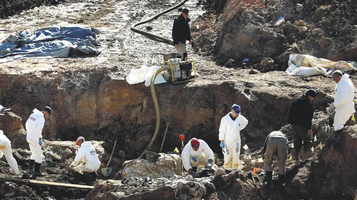 Ekshumacje we wsi Tomašica, jesień 2013 r. / Fot. AFP / EAST NEWS
