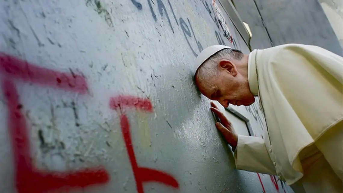 Przy murze oddzielającym Izrael od terytoriów palestyńskich, Betlejem, 25 maja 2014 r. / Fot. Osservatore Romano / AP / EAST NEWS