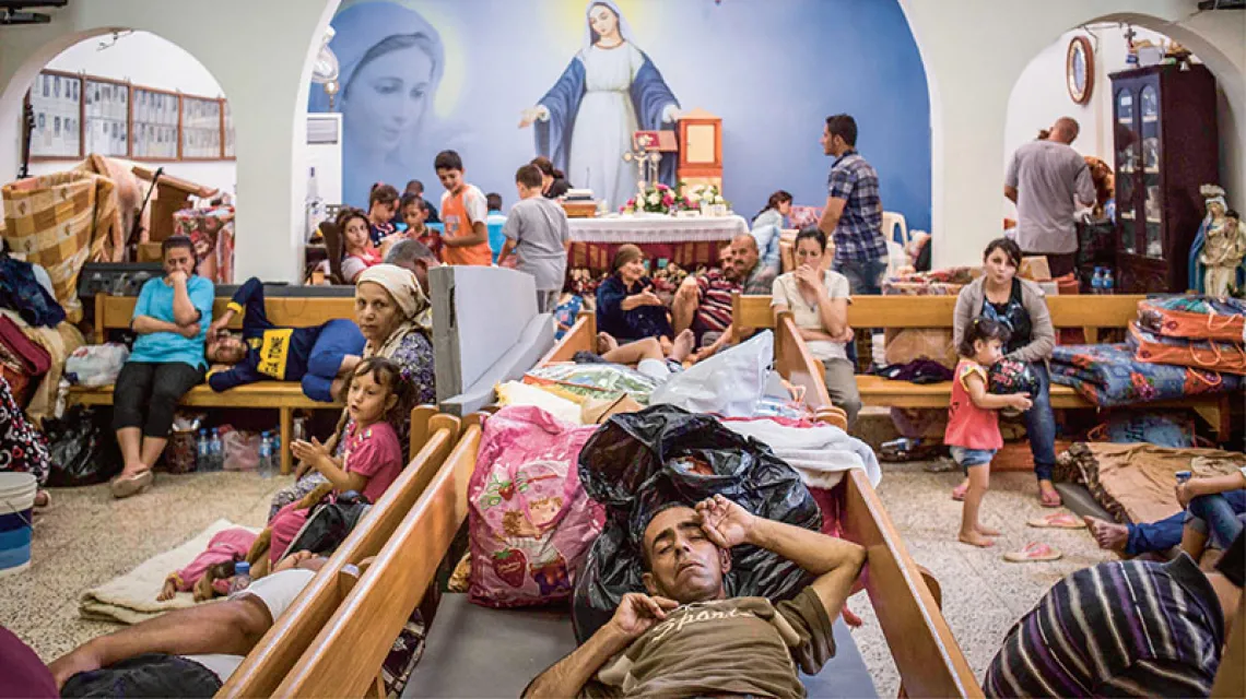 Kościół w Ankawie (Irak) jako tymczasowe schronienie kurdyjskich chrześcijan uciekających przed siłami ISIS, sierpień 2014 r. / Fot. Le Caer Vianney / SIPA / EAST NEWS