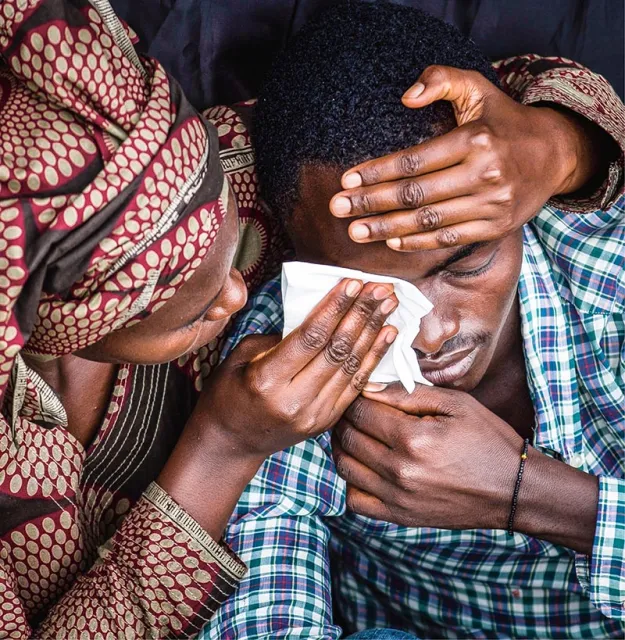 Podczas ceremonii 20. rocznicy ludobójstwa, Kigali, Rwanda, 7 kwietnia 2014 r. / Fot. Ben Curtis / AP / EAST NEWS