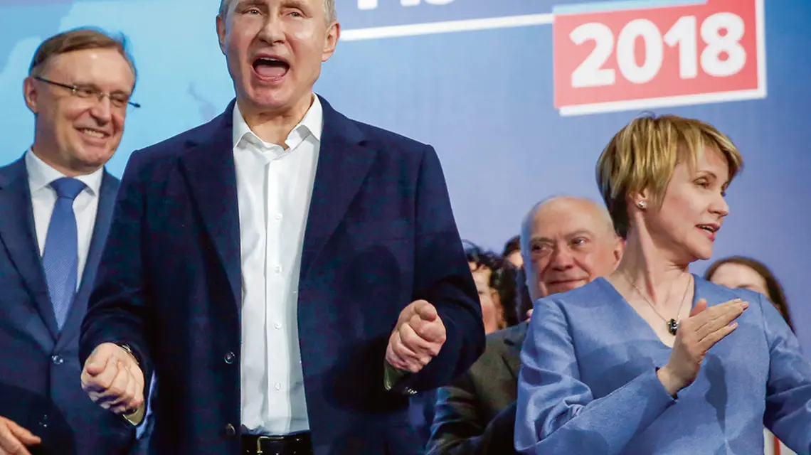 Władimir Putin świętuje zwycięstwo w wyborach prezydenckich, Moskwa, 18 marca 2018 r. / Fot. SERGEI ILNITSKY / EPA / PAP