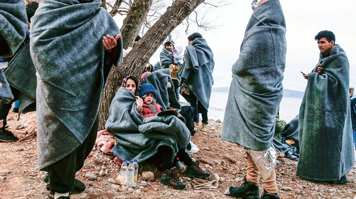 Afgańczycy, którzy dopłynęli do brzegów greckiej wyspy Lesbos, 28 lutego 2020 r. / COSTAS BALTAS / REUTERS / FORUM / 