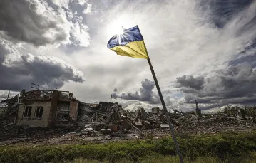 Zniszczone domy w wyzwolonej wsi Dolina w obwodzie donieckim. 2 października 2022 r. / METIN AKTAS / ABACA / PAP