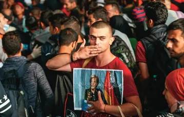 Uchodźcy z Syrii na dworcu w Monachium, 5 września 2015 r. / Fot. Sean Gallup / GETTY IMAGES