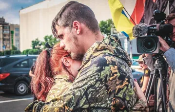 Podczas ceremonii żałobnej poświęconej poległym na pozycji „Butowka”, Kijów, 14 czerwca 2016 r. / Fot. Monika Andruszewska