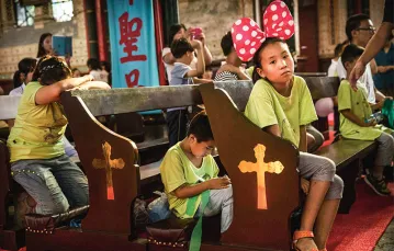 Najmłodsi katolicy Państwa Środka podczas letniej oazy w Pekinie, sierpień 2014 r.  / Fot. Kevin Frayer / GETTY IMAGES