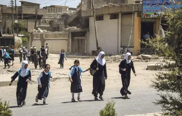 Powrót ze szkoły – już po deklaracji władz o „wyzwoleniu Mosulu”, 12 lipca 2017 r. / FADEL SENNA / AFP / EAST NEWS
