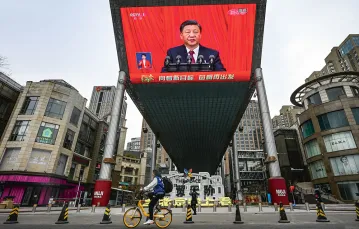Transmisja przemówienia prezydenta Chin Xi Jinpinga podczas sesji zamykającej Narodowy Kongres Ludowy. Pekin, 13 marca 2023 r. / JADE GAO / AFP / EAST NEWS