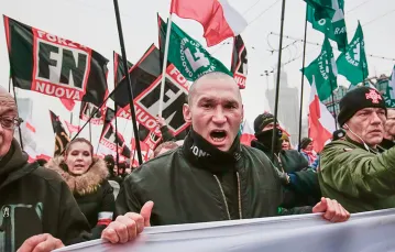 Nacjonaliści polscy i neofaszyści włoscy na Marszu Niepodległości, Warszawa, 11 listopada 2018 r. / JAKUB WŁODEK / NURPHOTO / GETTY IMAGES
