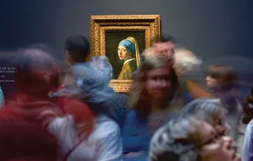 Wernisaż wystawy Vermeera w Rijksmuseum. W tle „Dziewczyna z perłą”. Amsterdam, 29 lutego 2023 r.  / JENS UMBACH / LAIF / FORUM