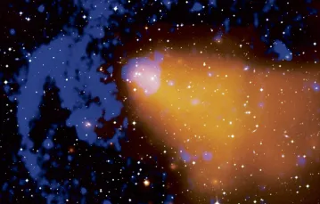 Gromada galaktyk Abell 3376 z nałożonym obrazem rentgenowskim (kolor złoty) i radiowym (niebieski). Obserwacje gromad galaktyk służą zrozumieniu ewolucji Wszechświata i natury ciemnej energii / fot. NASA / CXC / SAO/ A. Vikhlinin / 