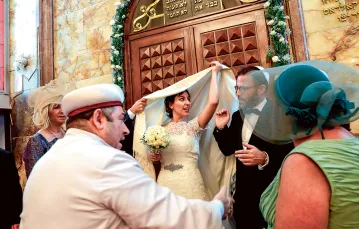 Ceremonia ślubna przygotowana przez wspólnotę żydowską z Izmiru na Europejskie Dni Kultury Żydowskiej. Synagoga Shalom, Stambuł, październik 2018 r. / MURAD SEZER / REUTERS / FORUM