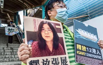 Protest w obronie aresztowanej dziennikarki Zhang Zhang w Hongkongu, 28 grudnia 2020 r. / MIGUEL CANDELA / EPA / PAP