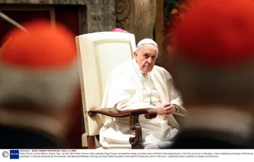 Papież Franciszek podczas spotkania z kardynałami z kurii rzymskiej, 22 grudnia 2014 r.