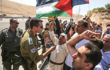Protest przeciwko decyzji sądu izraelskiego, nakazującego wyburzenie wiosek Beduinów w pobliżu Jerozolimy, 14 września 2018 r. / ISSAM RIMAWI / AFP / EAST NEWS