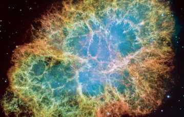 Mgławica Kraba rozciąga się na przestrzeni 10 lat świetlnych. To pozostałość po supernowej, która pojawiła się na niebie w 1054 r. / NASA, ESA, J. HESTER, A. LOLL (ASU)