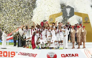 Piłkarska drużyna Kataru świętuje zwycięstwo w Pucharze Azji po wygranym meczu z Japonią. Abu Zabi, Zjednoczone Emiraty Arabskie, 1 luty 2019 r. / / Fot. Li Gang / Xinhua News / East News
