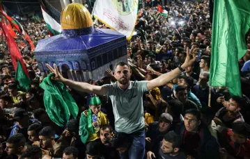 Po ogłoszeniu zawieszenia broni między Izraelem a Hamasem, Chan Junus w południowej Strefie Gazy 21 maja 2021 r. Fot. SAID KHATIB/AFP/East News / 