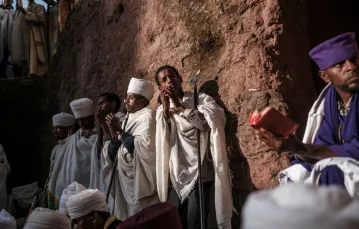 Obchody Bożego Narodzenia w Lalibeli przy granicy z Tigrajem, 650 kilometrów na północ od Addis Abeby. Etiopia, 7 stycznia 2022 / fot. EDUARDO SOTERAS/AFP/East News / 