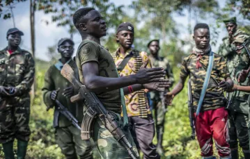 Uzbrojeni partyzanci niedaleko Rutshuru, 70 kilometrów na północ od Gomy, 22 czerwca 2022 r. / fot. AP/Associated Press/East News / 