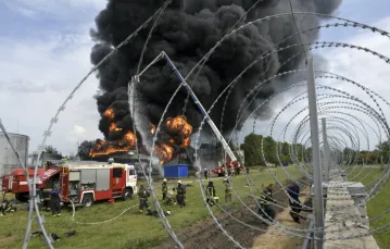 Eksplozja składu paliw w Woroneżu, mieście tymczasowo zajętym przez żołnierzy Grupy Wagnera. 24 czerwca 2023 r. / fot. Andrey Arxipov/Associated Press/East News / 