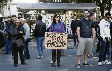 Protest przed parlamentem w Nikozji przeciwko powszechnemu podatkowi od depozytów bankowych; 18 marca 2013 r. / Fot. Yorgos Karahalis / REUTERS / FORUM