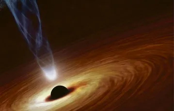 Artystyczna wizja czarnej dziury o masie nawet miliardów Słońc. Wiruje wokół niej materia wciągana przez potężną grawitację. Przedstawiono także strumień naładowanych cząstek zasilany ruchem obrotowym czarnej dziury. / Fot. NASA / JPL-Caltech