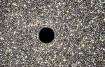 Zespoły astronomów pracujących przy teleskopach Hubble'a oraz Gemini North odkryły właśnie supermasywną czarną dziurę o masie ponad 21 mln razy większej od Słońca (na wizualizacji). Znajduje się ona w centrum małej i bardzo gęstej galaktyki M60-UCD1 / Fot. NASA, ESA, D. Coe, G. Bacon (STScI) 