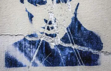 Graffiti z ks. Popiełuszką. Warszawa, wrzesień 2014 r. / Fot. Krystyna Blatkiewicz / REPORTER