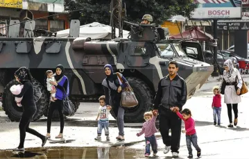 Ulica w Trypolisie (północny Liban) po walkach armii z islamistami; 27 października 2014 r. / Fot. Mohamed Azakir / REUTERS / FORUM