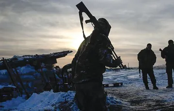 Ukraińscy żołnierze na froncie koło miejscowości Szczastia (w minionym tygodniu trwały tam ciężkie walki), grudzień 2014 r. / Fot. Paweł Bobołowicz