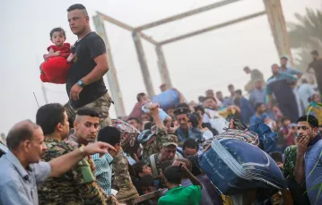 Sunniccy uchodźcy z Ramadi na przedmieściach Bagdadu, 19 maja 2015 r. /  / fot. STRINGER / REUTERS / FORUM
