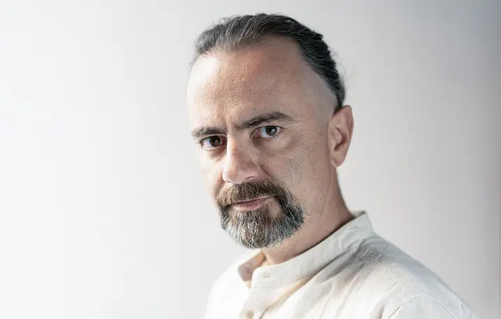 Michał Kuźmiński, dziennikarz Tygodnika Powszechnego