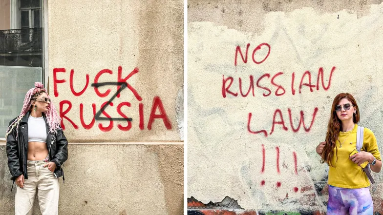 Maiko i Tamuna przed antyrosyjskim napisem na murze w Tbilisi. Gruzja, marzec 2022 r. // Fot. archiwum prywatne Maiko i Tamuna przed antyrosyjskim napisem na murze w Tbilisi. Gruzja, marzec 2022 r. // Fot. archiwum prywatne